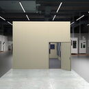 Interior view of a modern facility with an open room and equipment.