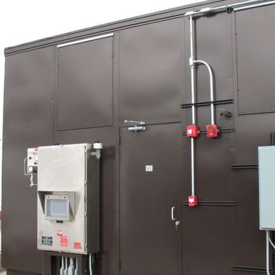 Industrial control panel and access door on equipment enclosure.