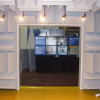 Soundproof room entrance showcasing acoustic treatment and informational displays.