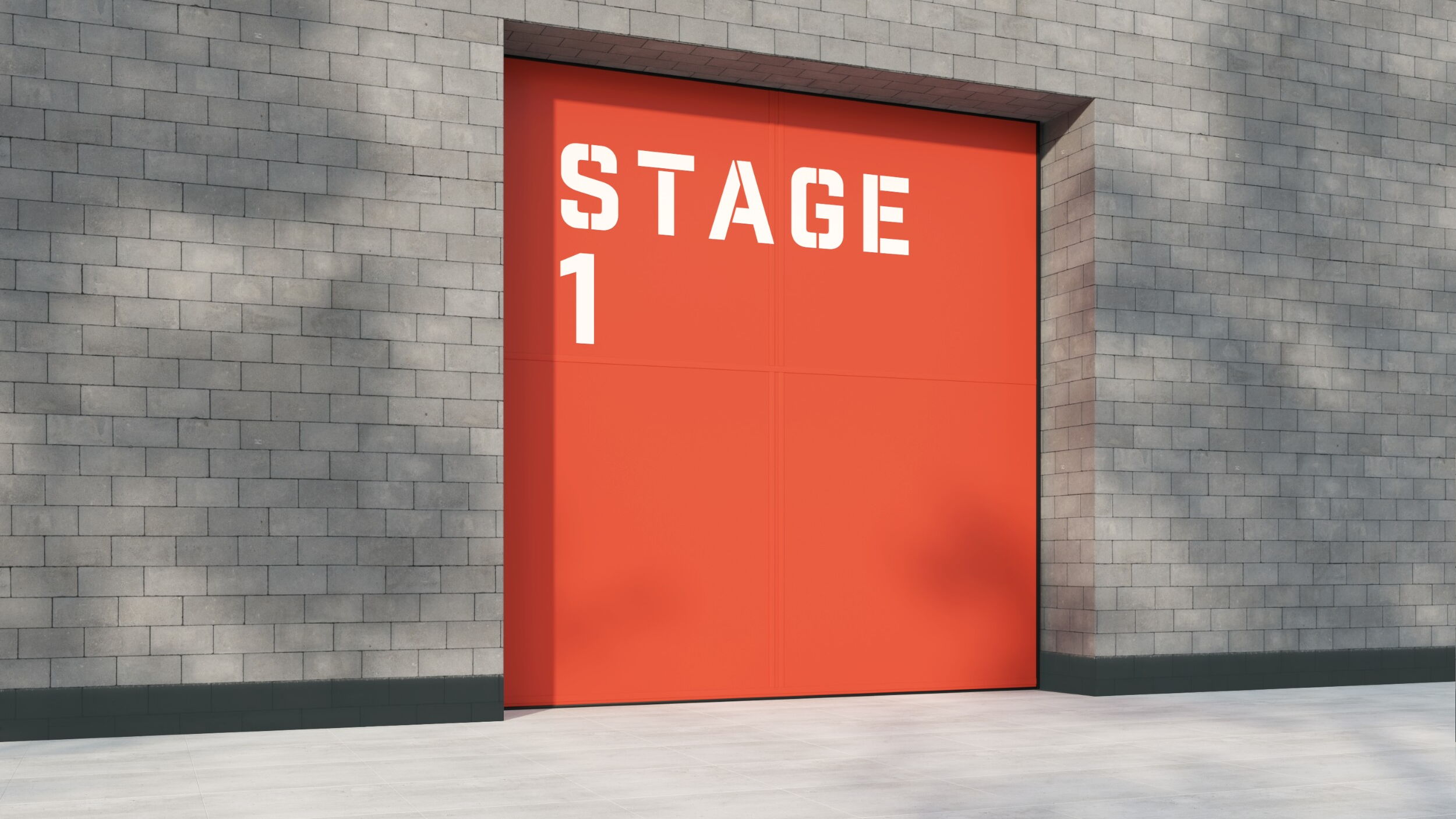 Orange stage door labeled "Stage 1" on gray brick wall.