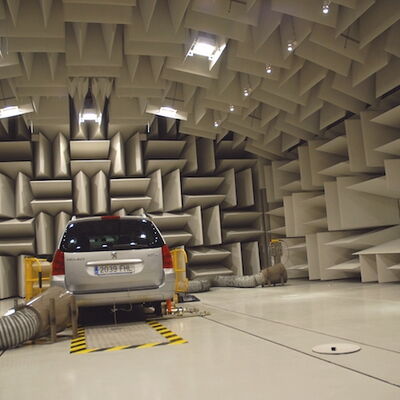 Car in an anechoic chamber designed for sound testing and research.
