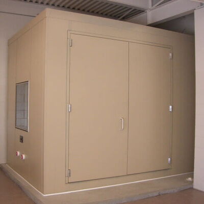 Storage unit with double doors and window in industrial setting.